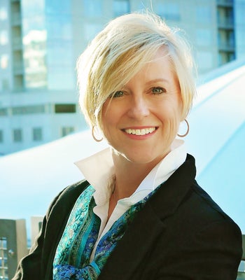 Portrait of Kristen Reese, Realtor®, Sr. Broker Associate.